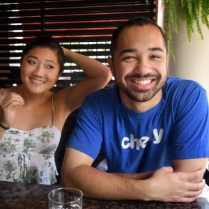 a man and a woman sitting at a table